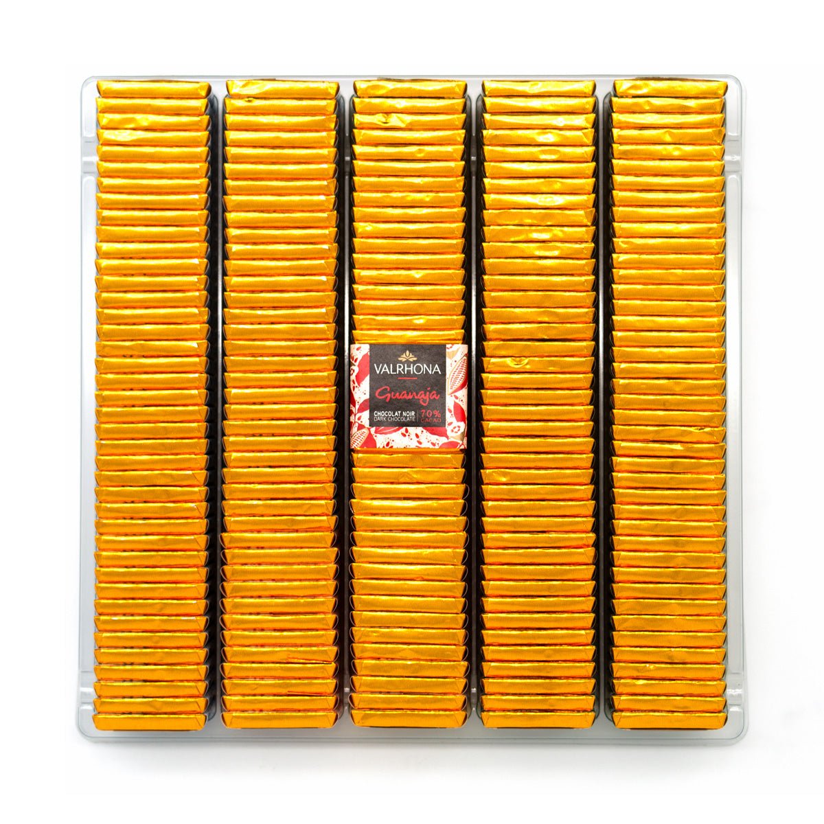 Packaged Valrhona chocolate squares with a visible brand label on a white background