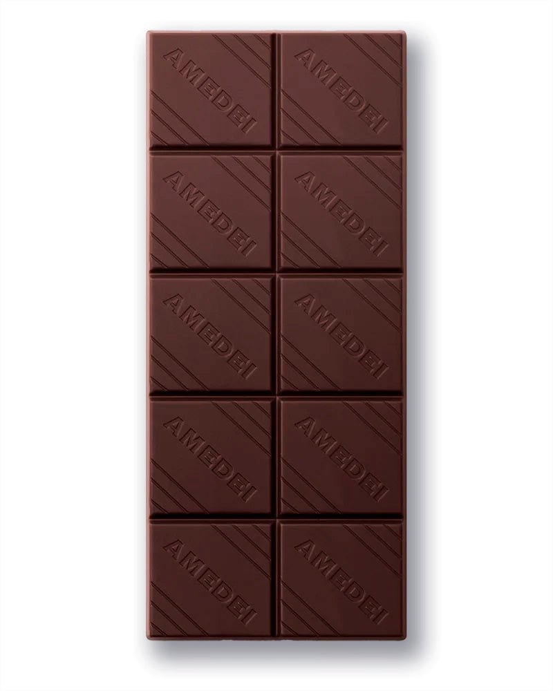 Chocolate bar with 'Amedei' branding on a white background