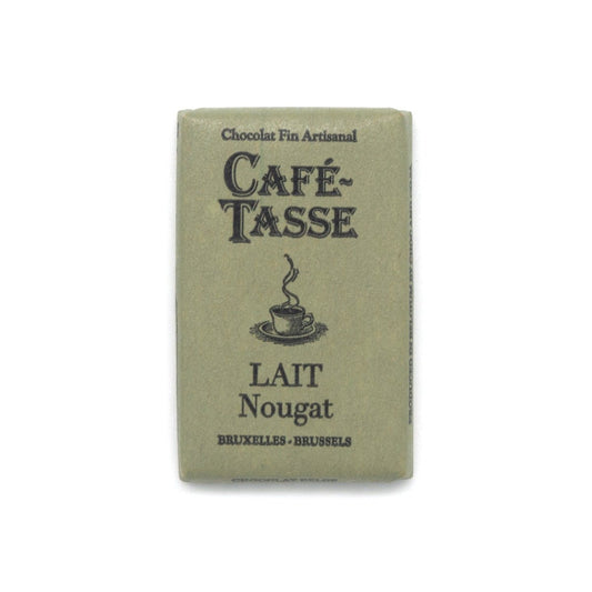 Café-Tasse Lait Nougat chocolate packaging with text and a coffee cup illustration on a white background