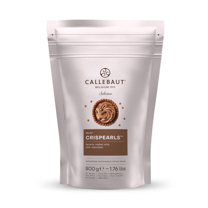 A stand-up pouch of Callebaut Crispearls Belgian Made chocolate, featuring a light beige background with a brown circular graphic and a brown label block, shown on a white background.