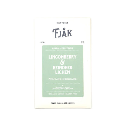 A vertical white chocolate bar packaging card for Fjåk Nordic Collection Lingonberry & Reindeer Lichen 70% Dark Chocolate, featuring a light sage green central label on a white background.