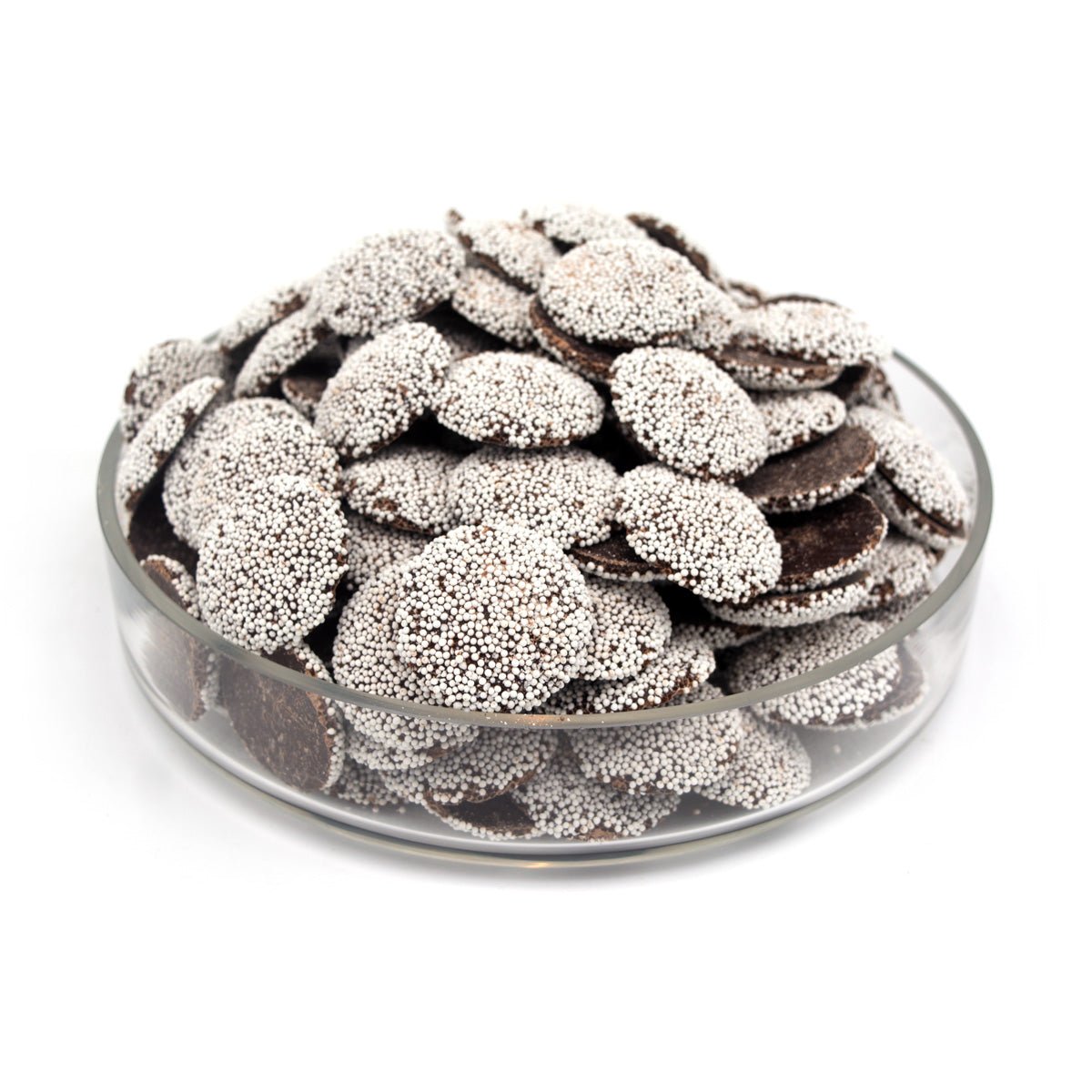 Glass bowl filled with chocolate pieces on a white background