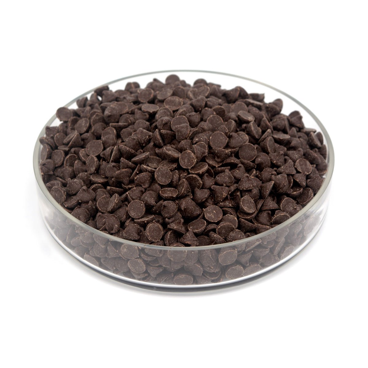 Glass bowl filled with chocolate chips on a white background