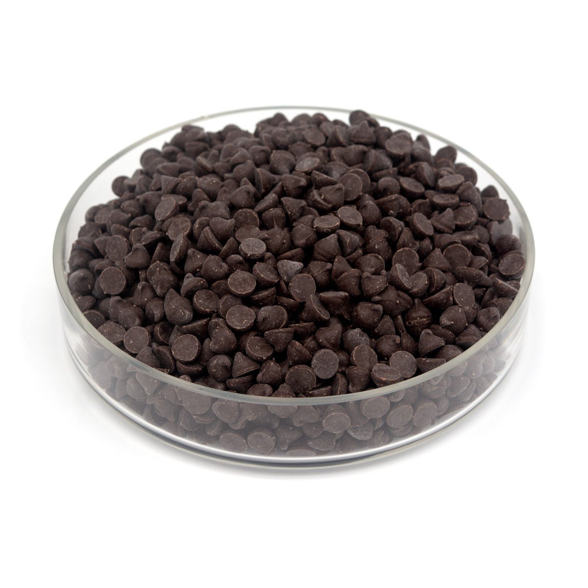 Glass bowl filled with chocolate chips on a white background