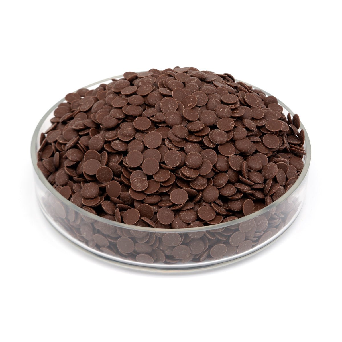 Glass bowl filled with brown chocolate chips on a white background