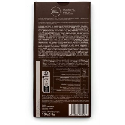 Chocolate bar packaging with detailed nutritional information on a white background