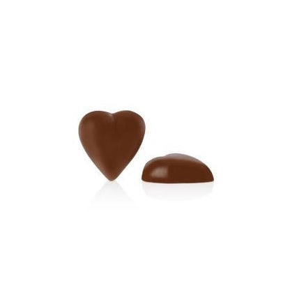 Two heart-shaped chocolate candies on a white background