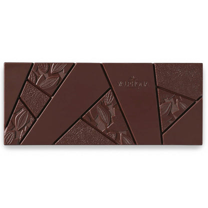 Chocolate bar with embossed designs on a white background