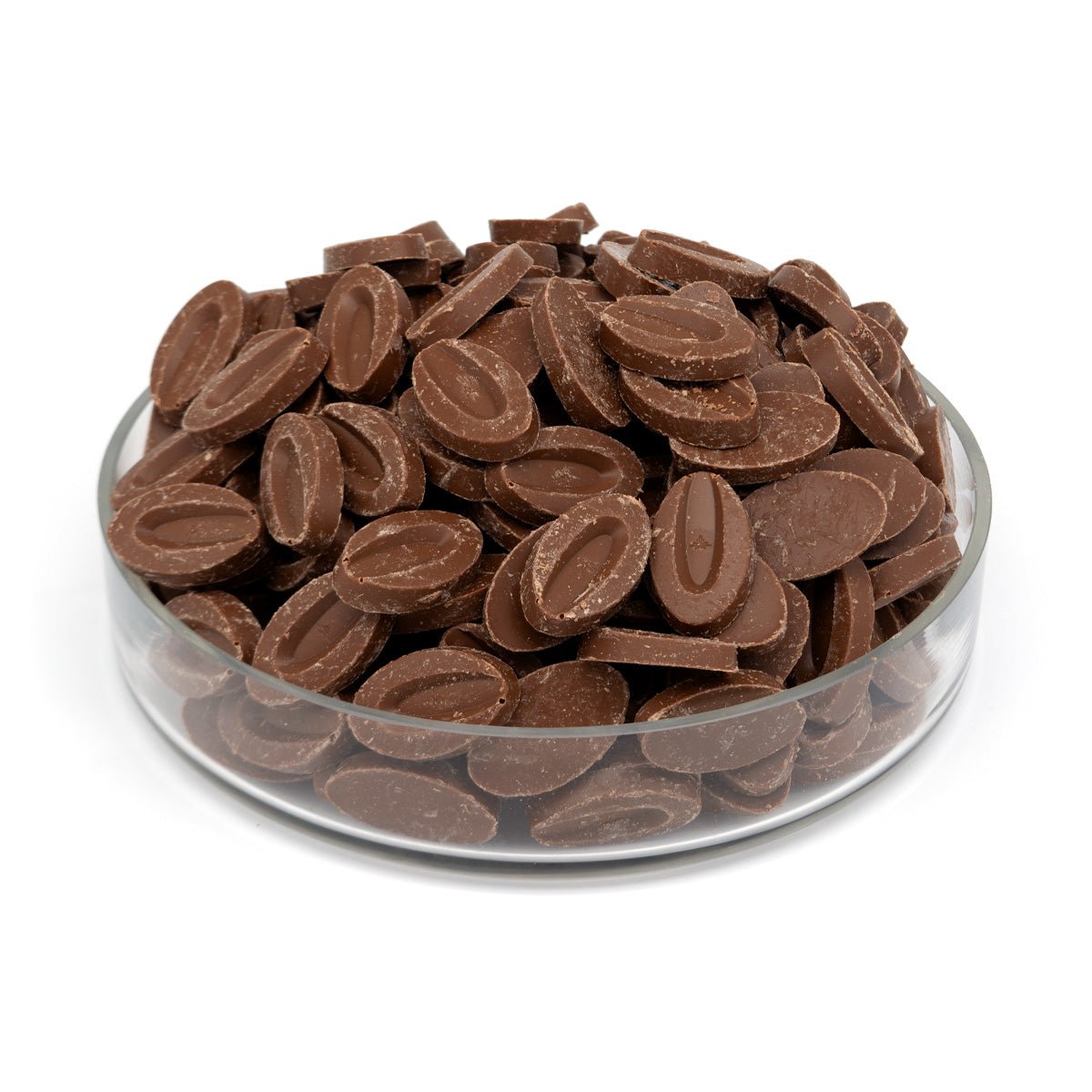 Glass bowl filled with chocolate chips on a white background
