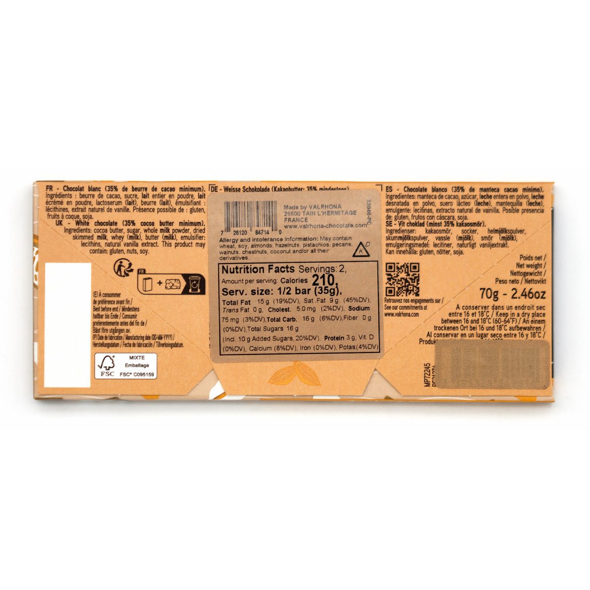 Close-up of a chocolate bar packaging with nutritional information on a white background