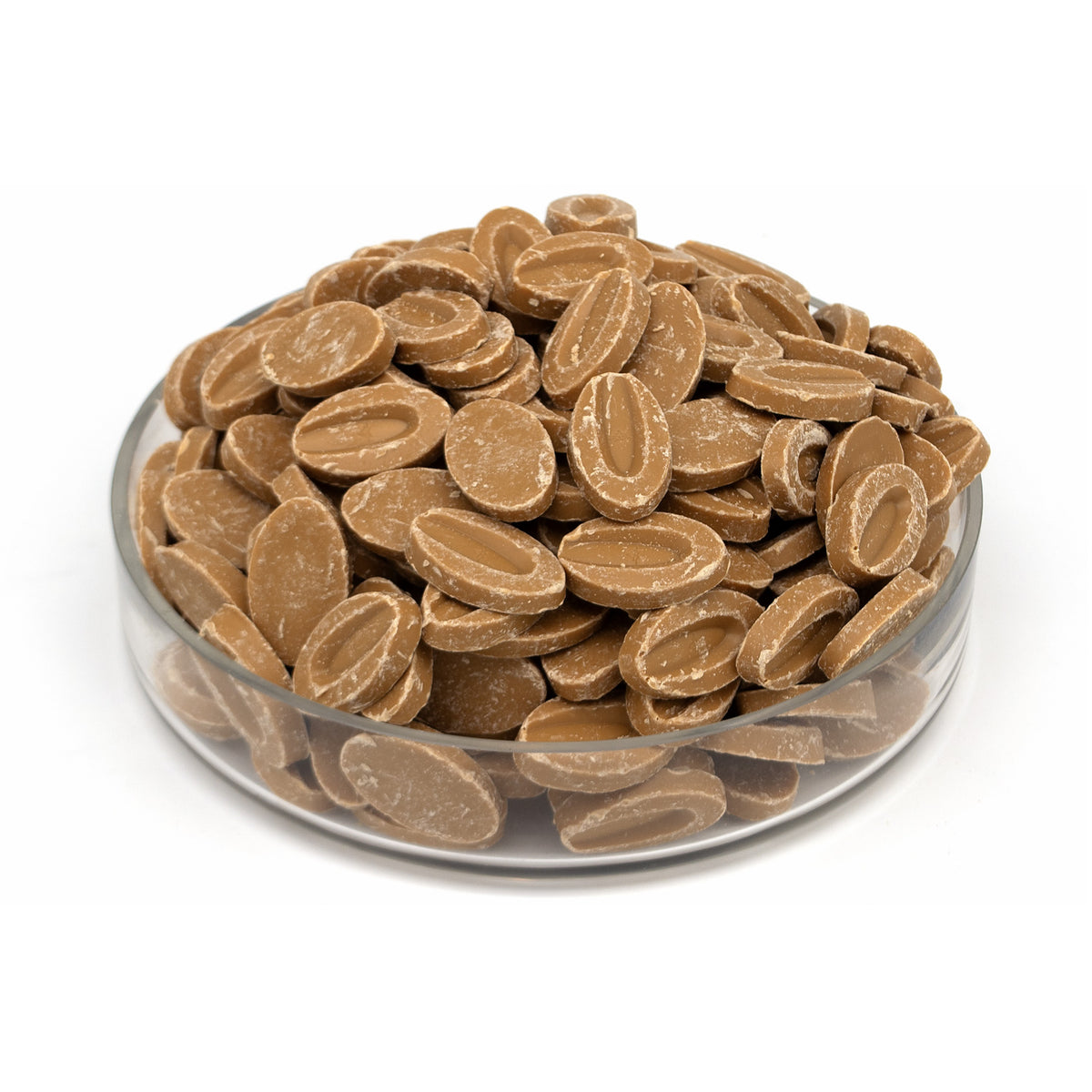 A clear glass bowl filled with oval brown chocolate feves, photographed on a clean white background.