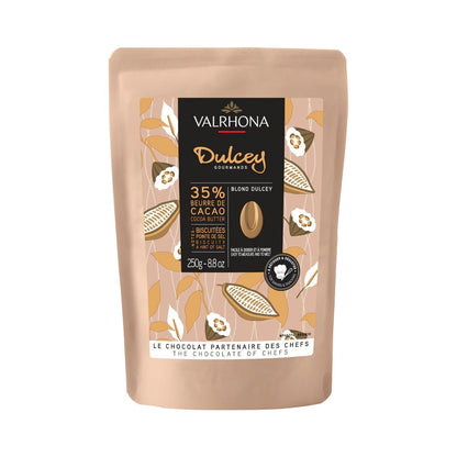 Valrhona Dulcey chocolate packaging with cacao bean design on a white background