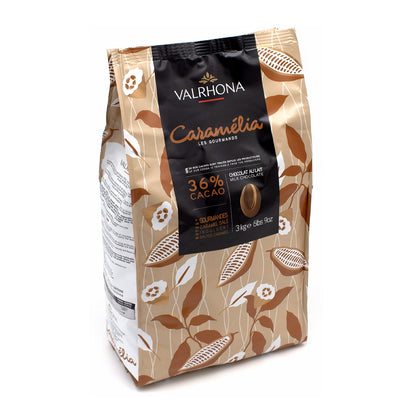 A 3 kg bag of Valrhona Caramelia 36% Cacao chocolate, featuring a beige and brown patterned design with a black central label.