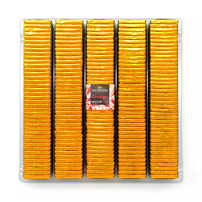Packaged Valrhona chocolate squares with a visible brand label on a white background